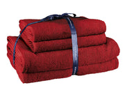 Gefaltetes rotes Handtuch-Set mit dunkelblauer Schleife gebunden