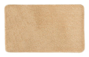 Rechteckige beige Badematte mit weicher, dichter Textur von oben gesehen