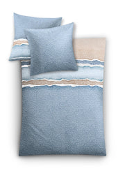 Bettwäsche-Set in Blau mit weißen Wellenmustern auf Decke und Kissen