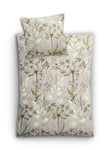 Bettwäsche-Set mit zartem beigefarbenem Bezug und grünem Blumenmuster