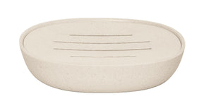 Ovale beige Seifenschale aus Kunststoff mit Rillen im Boden oben