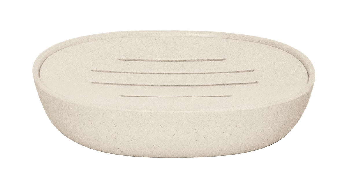 Ovale beige Seifenschale aus Kunststoff mit Rillen im Boden oben