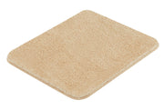 Rechteckige, beige Badematte mit weichem Flor und abgerundeten Ecken