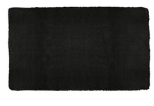 Rechteckige schwarze Badematte mit weicher, flauschiger Oberfläche
