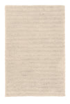 Rechteckiger, hochfloriger Badteppich in hellem Beige von oben gesehen