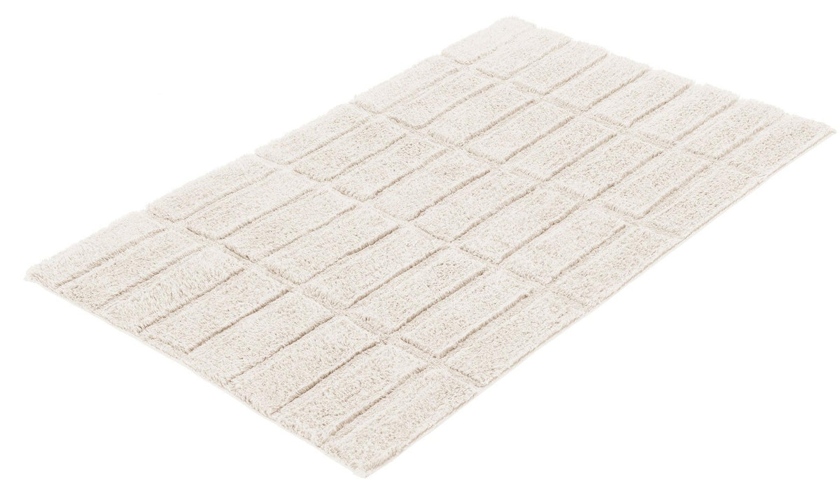 Rechteckige cremefarbene Badematte mit weichem hochflorigem Karomuster