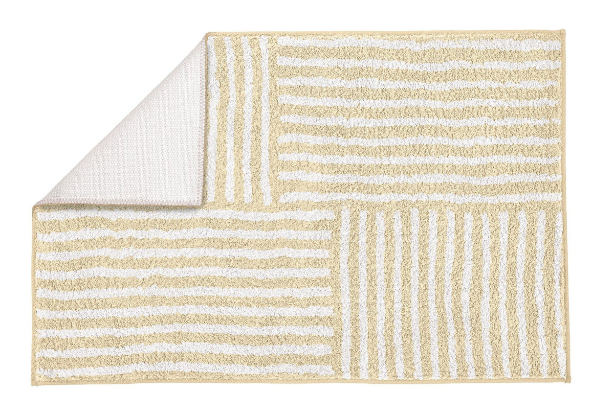 Beige-weiße rechteckige Badematte mit unterschiedlich breiten Streifen