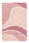Rosafarbiger Badteppich mit geschwungenem Muster in Rosa und Weiß.