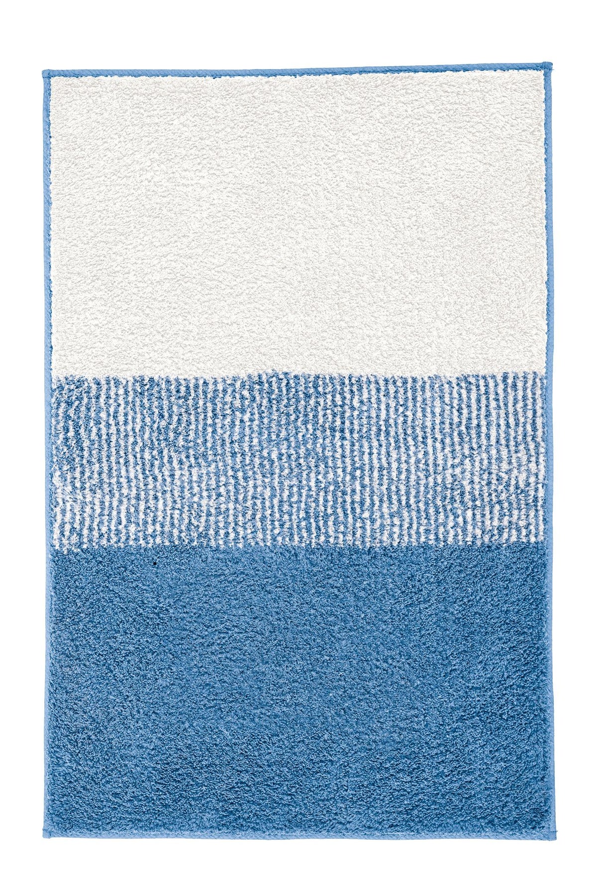 Blau-weißer Badteppich mit strukturiertem Muster und breitem Farbverlauf.