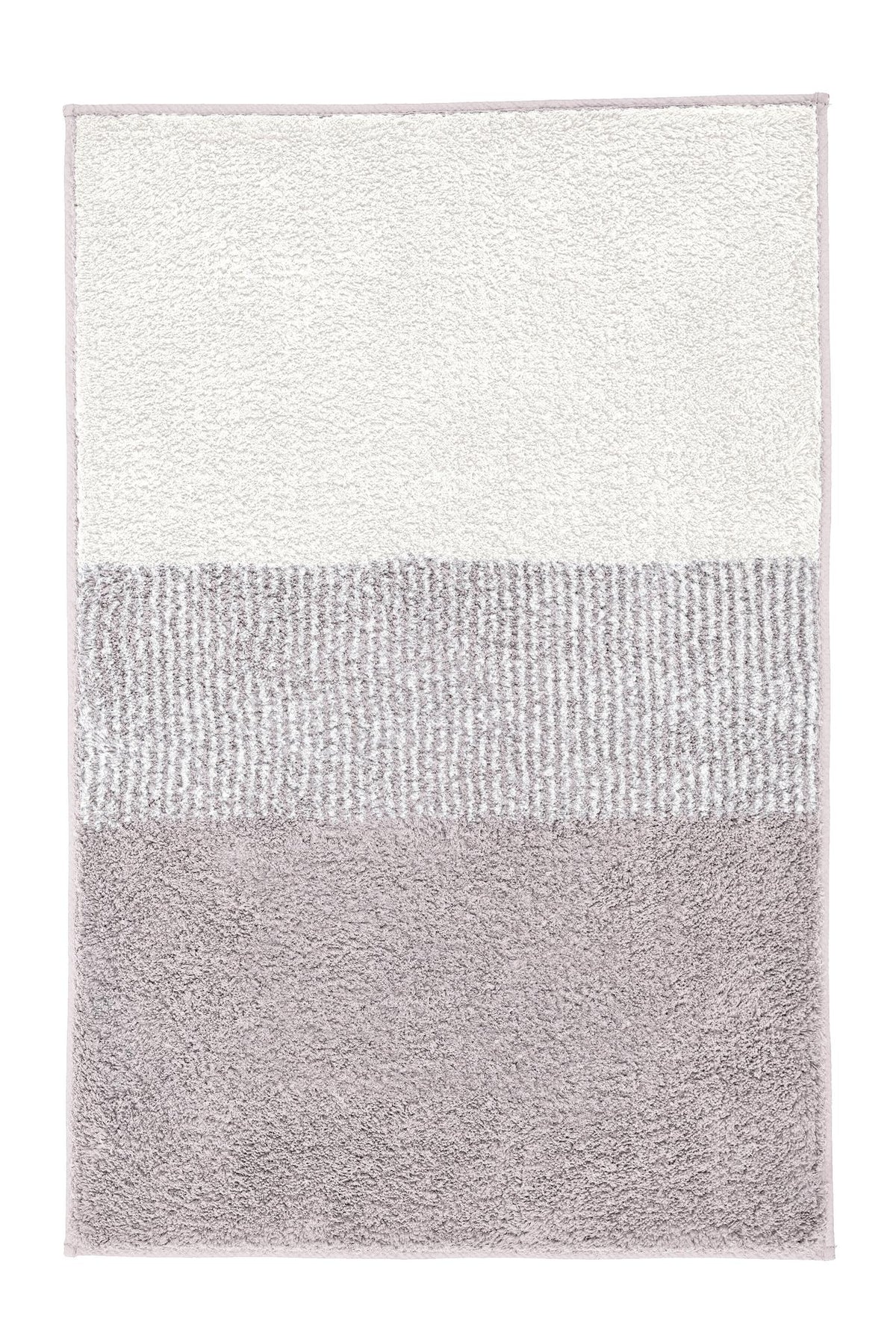 Rechteckiger Badteppich in Weiß und Taupe mit sanftem Farbverlauf.