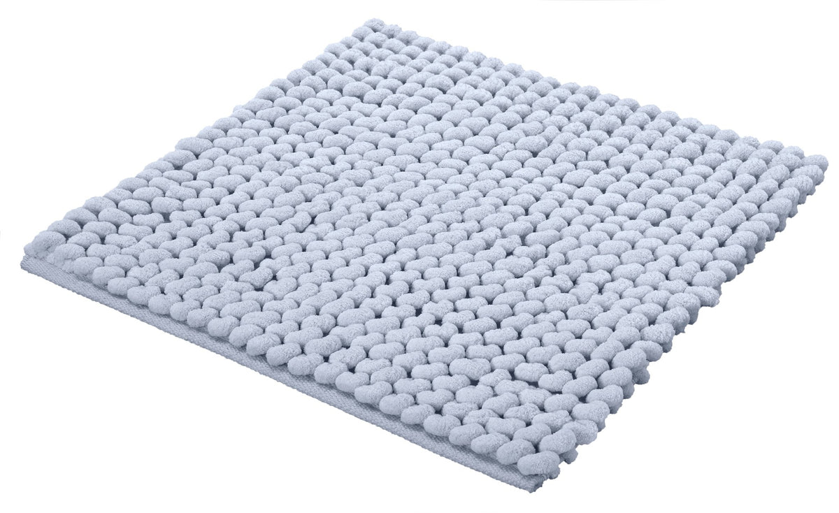 Hellblauer, quadratischer Badematte mit dicker Noppenstruktur aus Textil