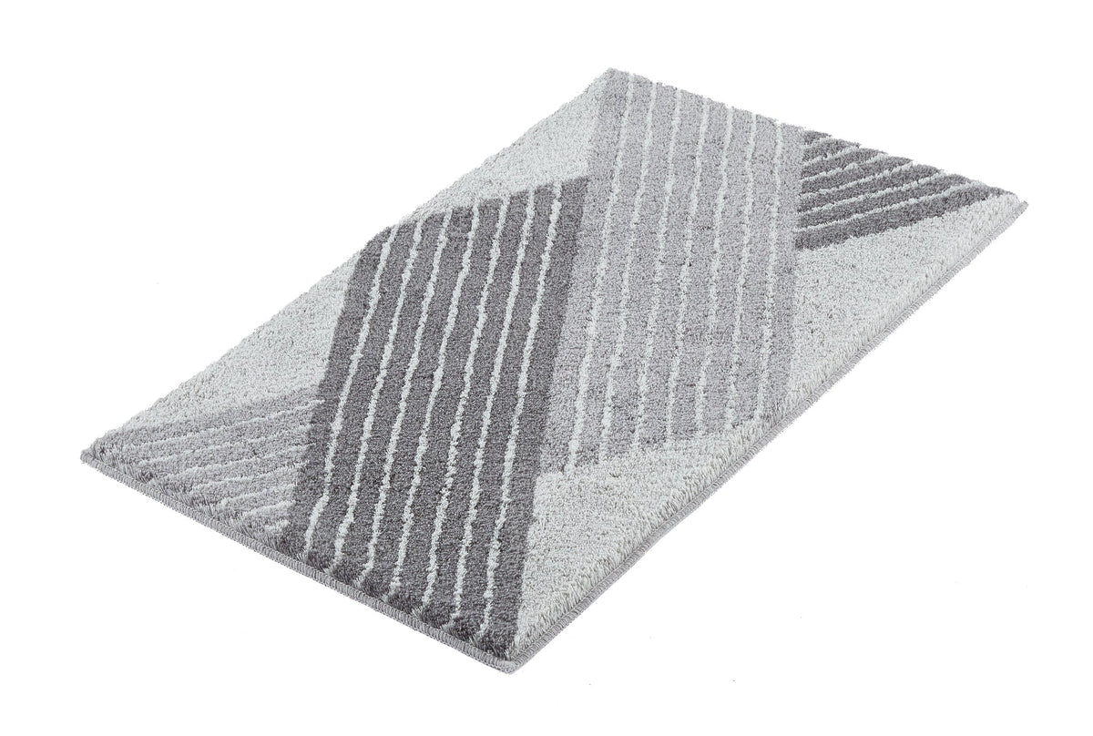 Graue rechteckige Badematte mit geometrischem Streifenmuster mit Relief