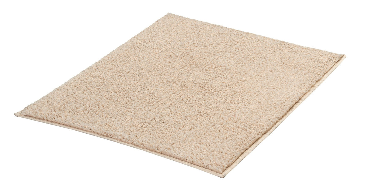 Rechteckige beige Badematte aus weichem, dichtem Hochflor Teppich