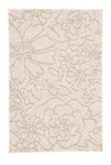 Cremefarbiger Badteppich mit floralem Muster in heller Reliefoptik.