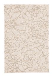 Cremefarbiger Badteppich mit floralem Muster in heller Reliefoptik.