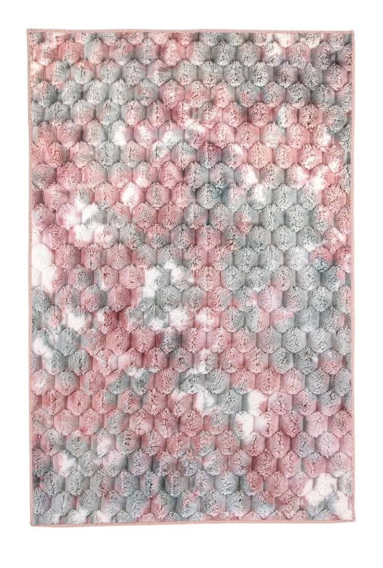 Rechteckiger Hochflorteppich in Rosa, Grau und Weiß mit Wabenmuster.