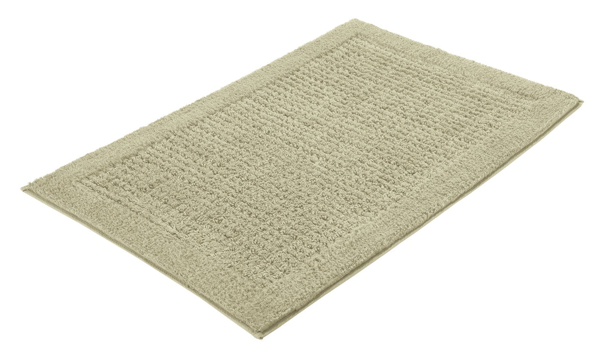 Rechteckige, beige Badematte mit weicher, dicht gewebter Oberfläche
