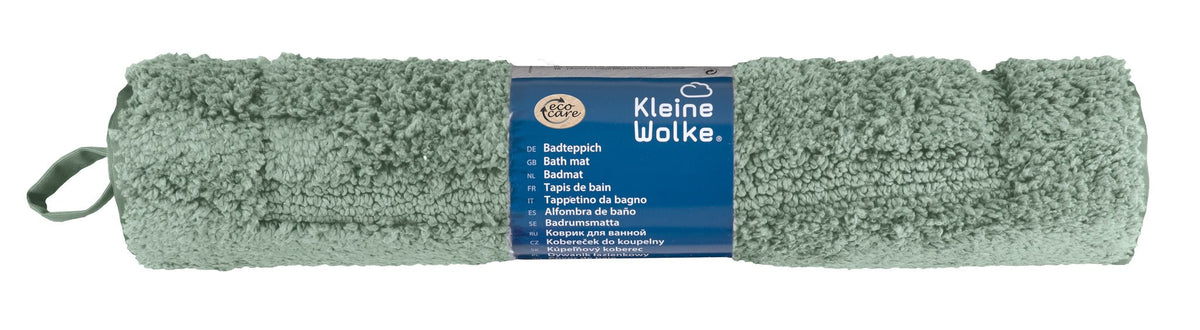 Gerollter mintgrüner Badteppich mit blauem Kleine-Wolke-Etikett