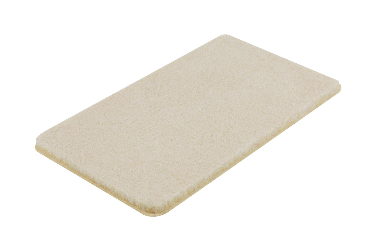 Rechteckige beige Badematte mit weicher Oberfläche von oben ansicht
