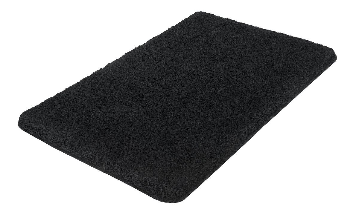 Rechteckige schwarze Badematte mit weicher, dichter, flauschiger Oberfläche