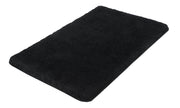 Schwarze rechteckige Badematte mit weicher, hochfloriger Oberfläche