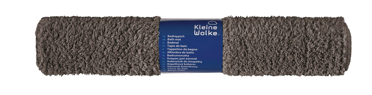 Graue rechteckige Badematte mit dichtem Flor, gerollt mit Etikett