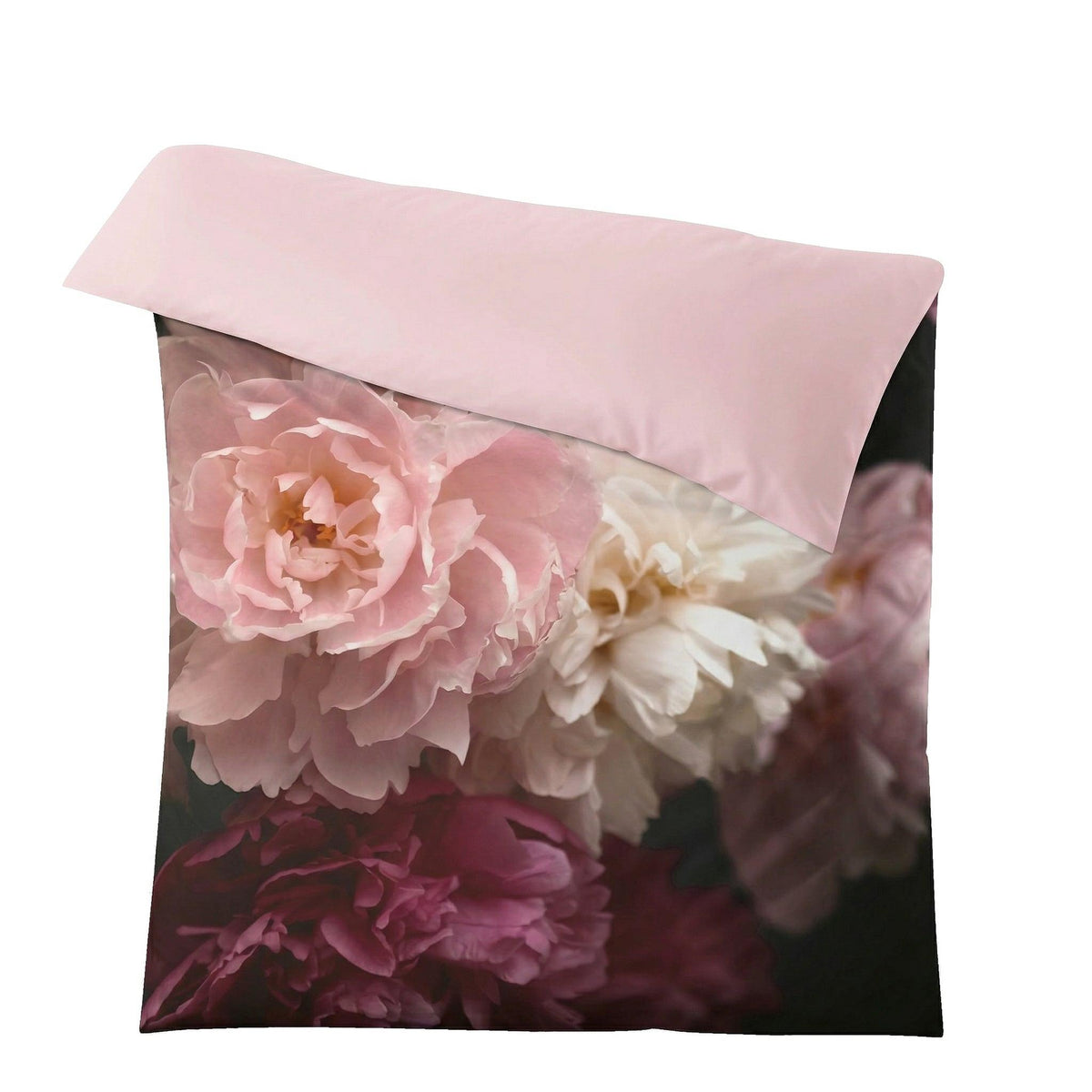 Rosa Bettwäsche mit großem floralem Blütenmuster in zarten Tönen.