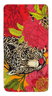 Buntes Badetuch mit Leopardenkopf und großen roten Blumenmotiven