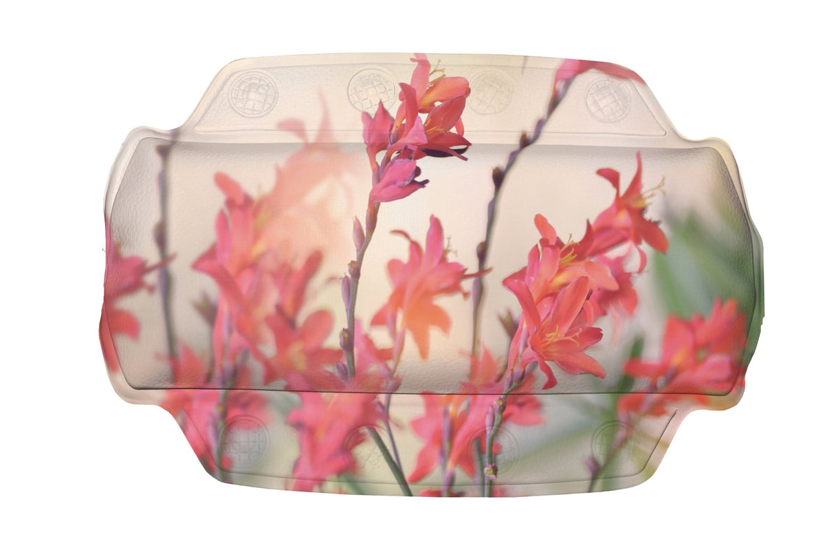 Transparente Unterlage mit zarten rosa Blüten vor hellem Hintergrund